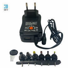 „Riff“ universalus 12 / 30 W (maks. 2,1 A) maitinimo adapteris + USB su 3–12 V rankiniu jungikliu ir 6 kištukais rinkiny „Riff“ universalus 12 / 30 W (maks. 2,1 A) maitinimo adapteris + USB su 3–12 V rankiniu jungikliu ir 6 kištukais rinkiny