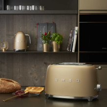 Smeg 50-ųjų stiliaus skrudintuvas TSF01CHMEU šampano spalvos