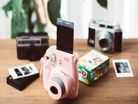 Instant cameras